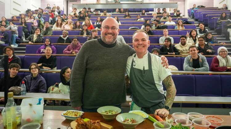 Picture of Rob Appleby and Simon Wood with students in the background